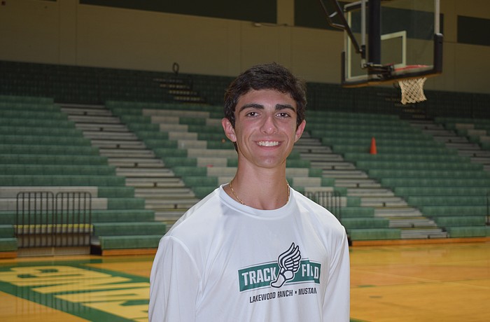 Kenny DeStefano poses for a photo before an Oct. 20 team practice. The junior was one of three Mustangs to place in the top five at the Out-of-Door Invitational on Oct. 18, and one of five to crack the top 10.