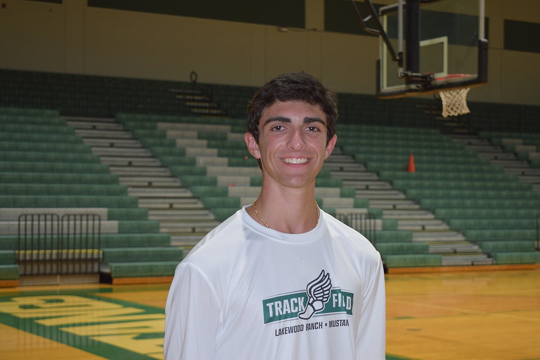 Kenny DeStefano poses for a photo before an Oct. 20 team practice. The junior was one of three Mustangs to place in the top five at the Out-of-Door Invitational on Oct. 18, and one of five to crack the top 10.