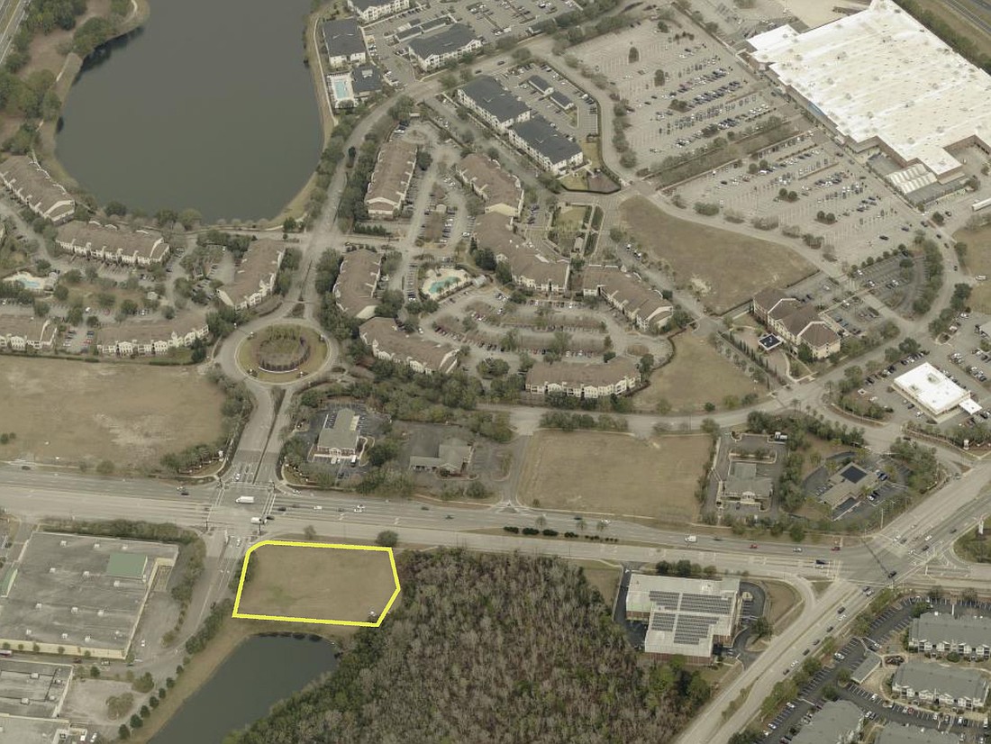 A self-storage facility is being explored in Arlington south of Tredinick Parkway opposite Kendall Town Boulevard. The Kendall Town Walmart Supercenter is the building at the top right.