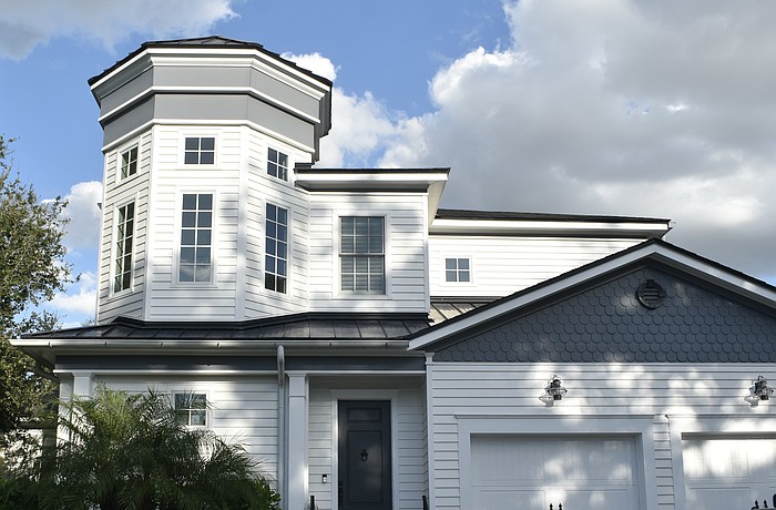 The first property at 1714 Irving St. was built in 2012 and has four bedrooms, four-and-a-half baths, a pool and 3,718 square feet of living area. The second property was built in 2012 and has one bedroom, one bath and 797 square feet of living area.