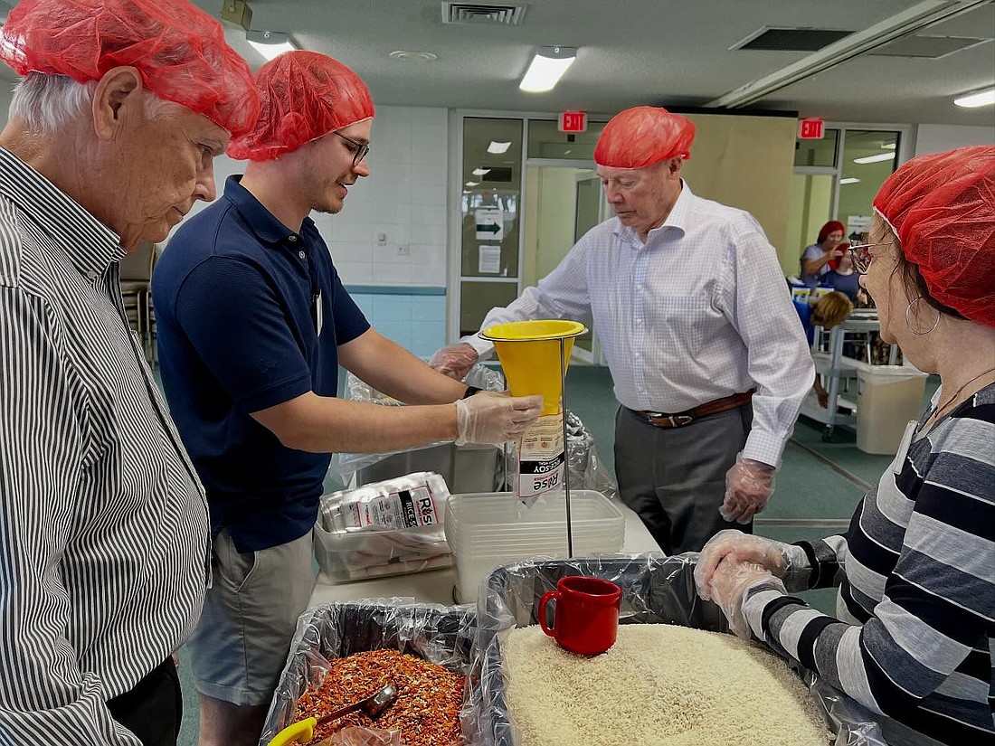 Ormond Beach Presbyterian Church members fills meal bags for Rise Against Hunger. Courtesy photo