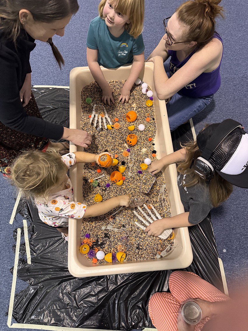Children enjoy a spooky themed activity as part of Social Seeds. Courtesy photo