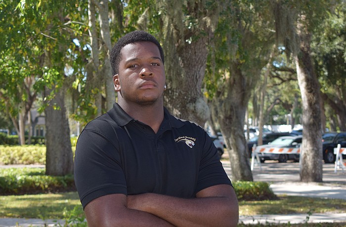 Elijah Golden poses for a photo on Oct. 17 at Cardinal Mooney Catholic High School. After seasons with King George (VA) and IMG Academy, he's found a home with Cardinal Mooney, and has helped the squad to the state's No. 1 overall ranking.