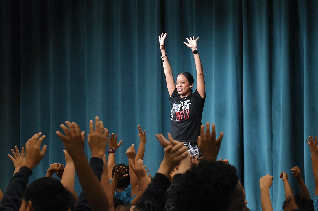 Paige Hernandez leads students.