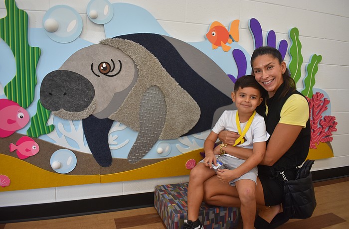 Gene Witt Elementary School pre-K student Daniel Gordon was joined by his mother Christina Gordon for the field trip to the Soar Lab on Oct. 21. The manatee sensory wall provides children an opportunity to feel different textures.