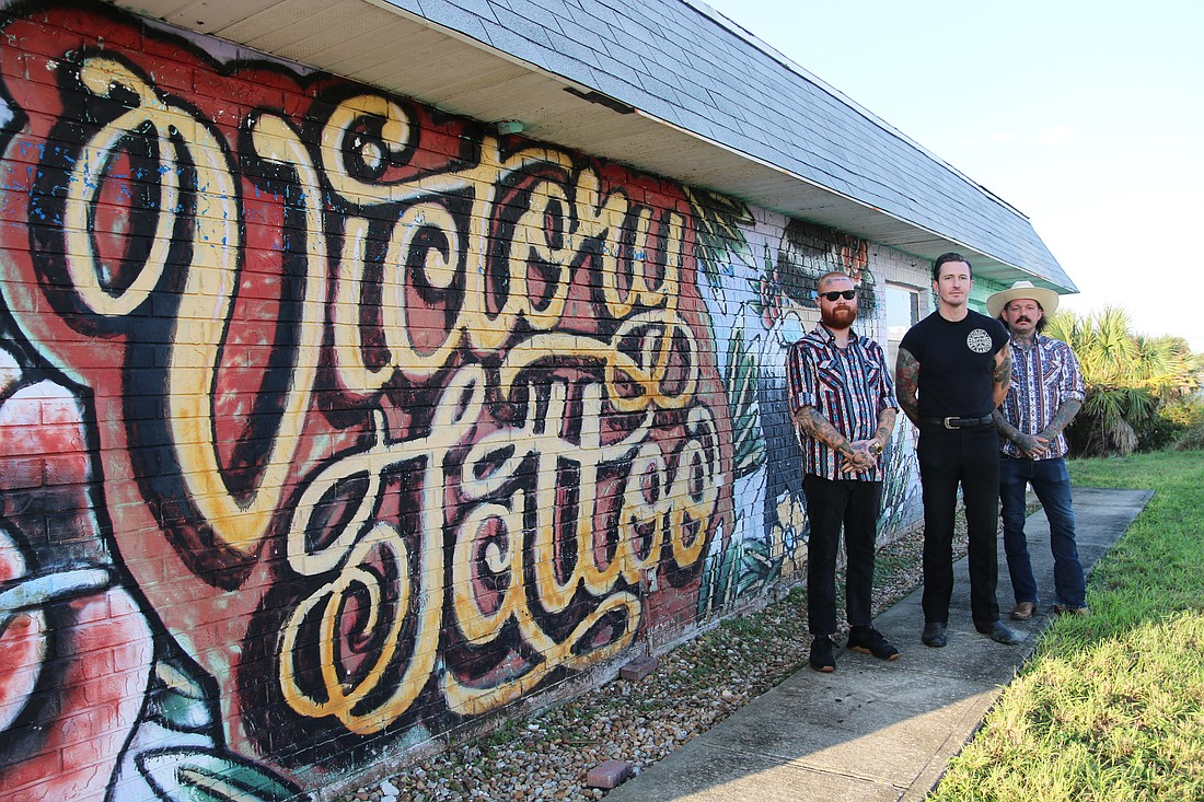 Desmond Larmer, Bobby Ellis and Drew McElveney, of Victory Tattoo. Photo by Jarleene Almenas