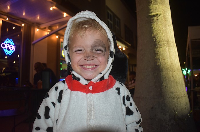 After a fun filled night at Boo Fest on Lakewood Ranch Main Street, Bradenton's Lennox Craig, 3, is all smiles dressed as one of the 101 dalmations.
