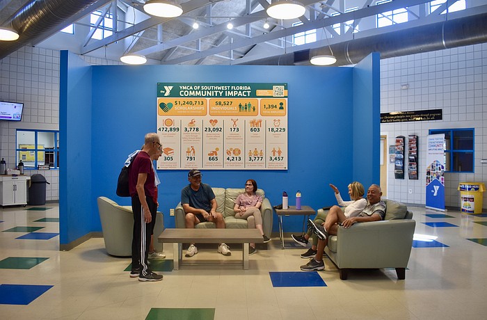 Members congregate in the lobby of the Lakewood Ranch YMCA to socialize after exercising.