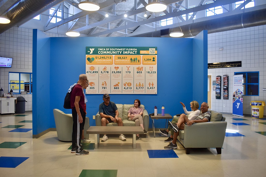 Members congregate in the lobby of the Lakewood Ranch YMCA to socialize after exercising.
