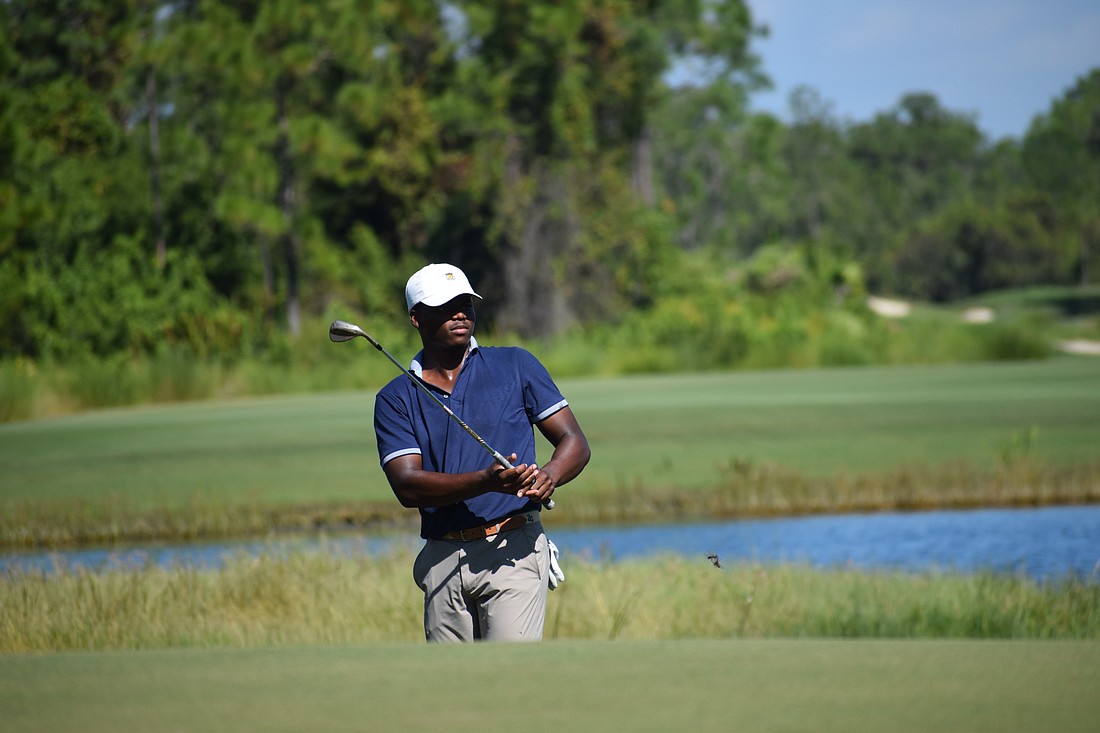 Everett Whiten Jr. watches his chip shot approach the hole on Oct. 22 at The Concession Golf Club. The 24-year-old native of Chesapeake, Virginia, won the 2025 Billy Horschel Invitational.