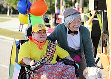 This year makes 22 years of the Boo Run, which has been referred to as the "day of Grayson." Grayson Tullio dresses as Russell from the Disney movie "Up" while his great friend Monika Oberer dresses as his Carl Fredricksen.