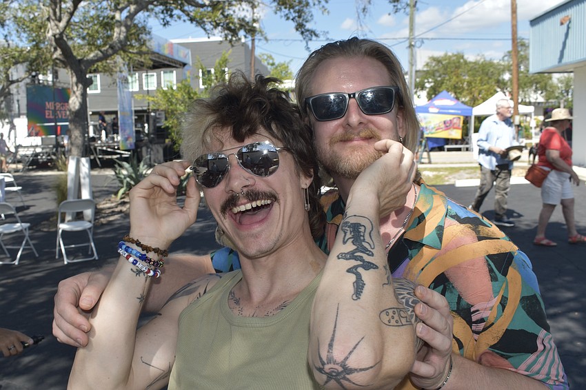 Headlining artist Zee Machine of Los Angeles poses with Atune.