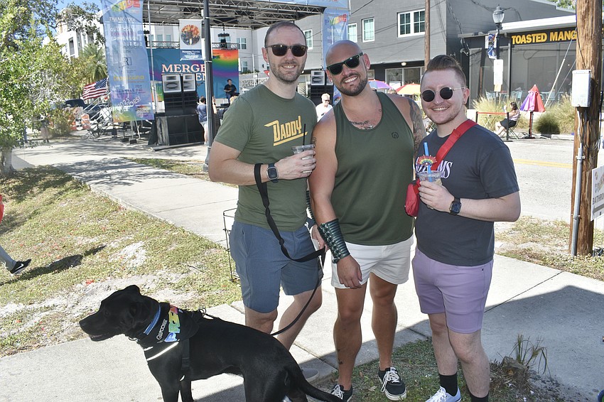 Matt Kastl, Dillon Schuman, Casey Meaux and Koda enjoy the event.