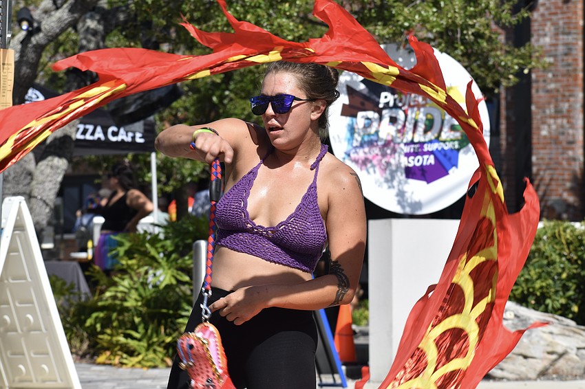 Kay Mount waves a banner.