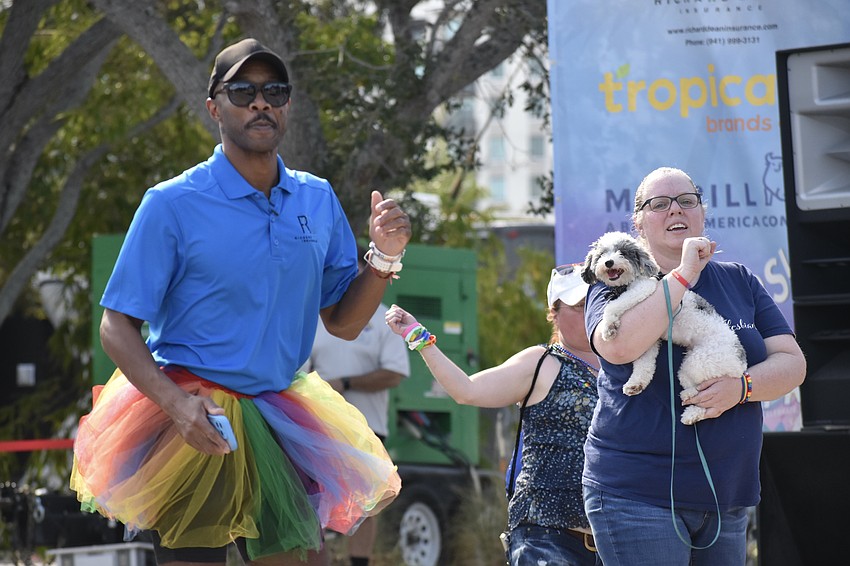 Donald Matthews, Jennie Wedeking, and Benny dance to the live music.