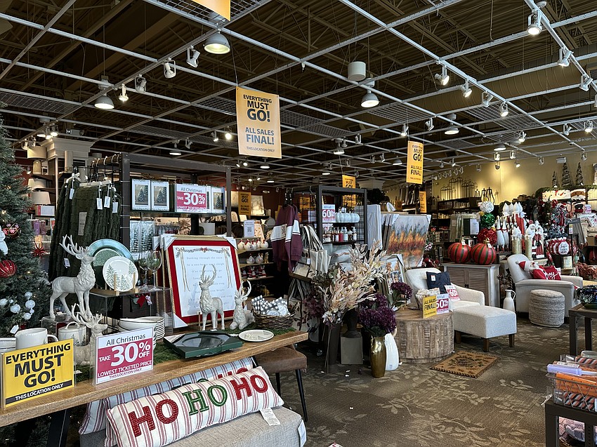 Yellow signs hung and posted throughout Kirkland's in The Markets at Town Center say: “Everything Must Go! All Sales Final! This location only.”