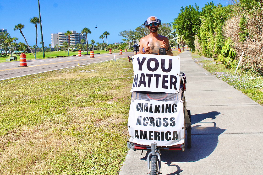 In an effort to raise support for mental health services, Kyndal Ray Edwards is walking to all four corners of the country. He reached Longboat Key on Oct. 25, and he set his sights on Sarasota on his journey southward.