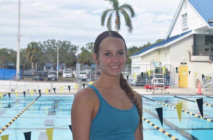 Zoe Gruber poses for a photo on Oct. 27 at Selby Aquatic Center during an afternoon practice with Sarasota Sharks. The junior racked up a team-high three gold medals at districts to guide the Thunder to a first-place finish.