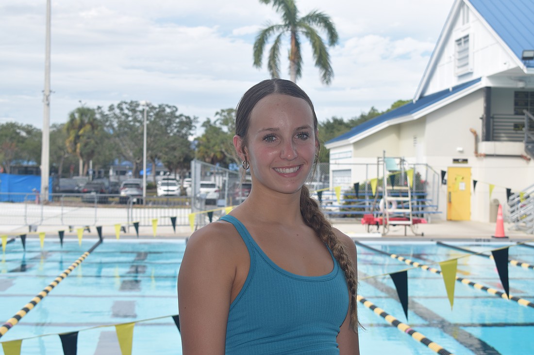 Zoe Gruber poses for a photo on Oct. 27 at Selby Aquatic Center during an afternoon practice with Sarasota Sharks. The junior racked up a team-high three gold medals at districts to guide the Thunder to a first-place finish.