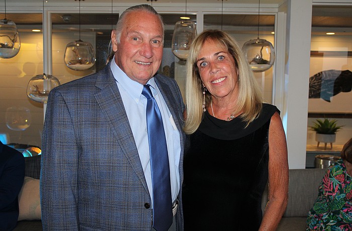 Rev. Bill Friederich and his wife, Bah Hero, attend the Longboat Key Chamber of Commerce annual awards banquet, at which Longboat Island Chapel won the Business Resilience Award. He is leaving the chapel and taking up a leadership role at Saint Andrew United Church of Christ.