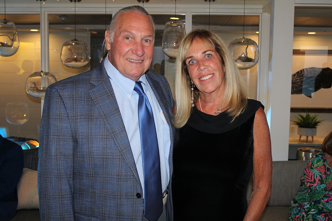 Rev. Bill Friederich and his wife, Bah Hero, attend the Longboat Key Chamber of Commerce annual awards banquet, at which Longboat Island Chapel won the Business Resilience Award. He is leaving the chapel and taking up a leadership role at Saint Andrew United Church of Christ.