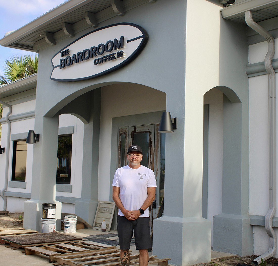 Robbie O'Brien with his newest expansion, The Boardroom Coffee Co. Photo by Alexis Miller