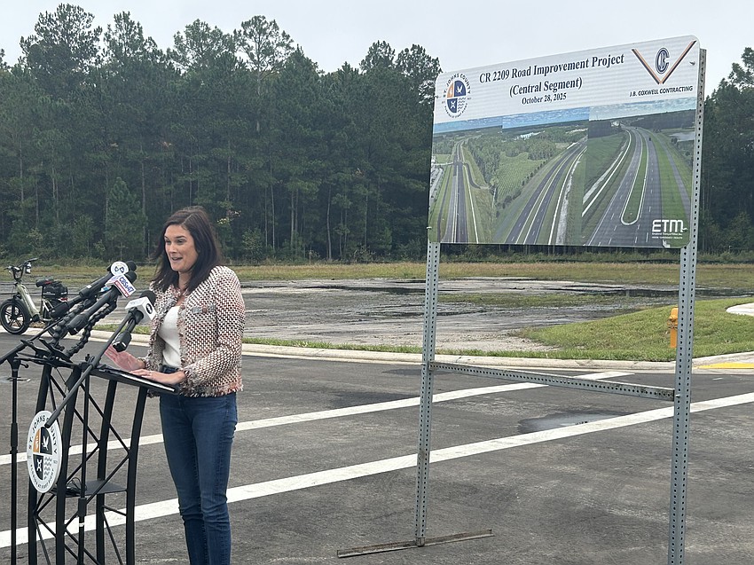 St. Johns County Commissioner Sarah Arnold speaks at a ribbon-cutting for County Road 2209 in St. Johns County.