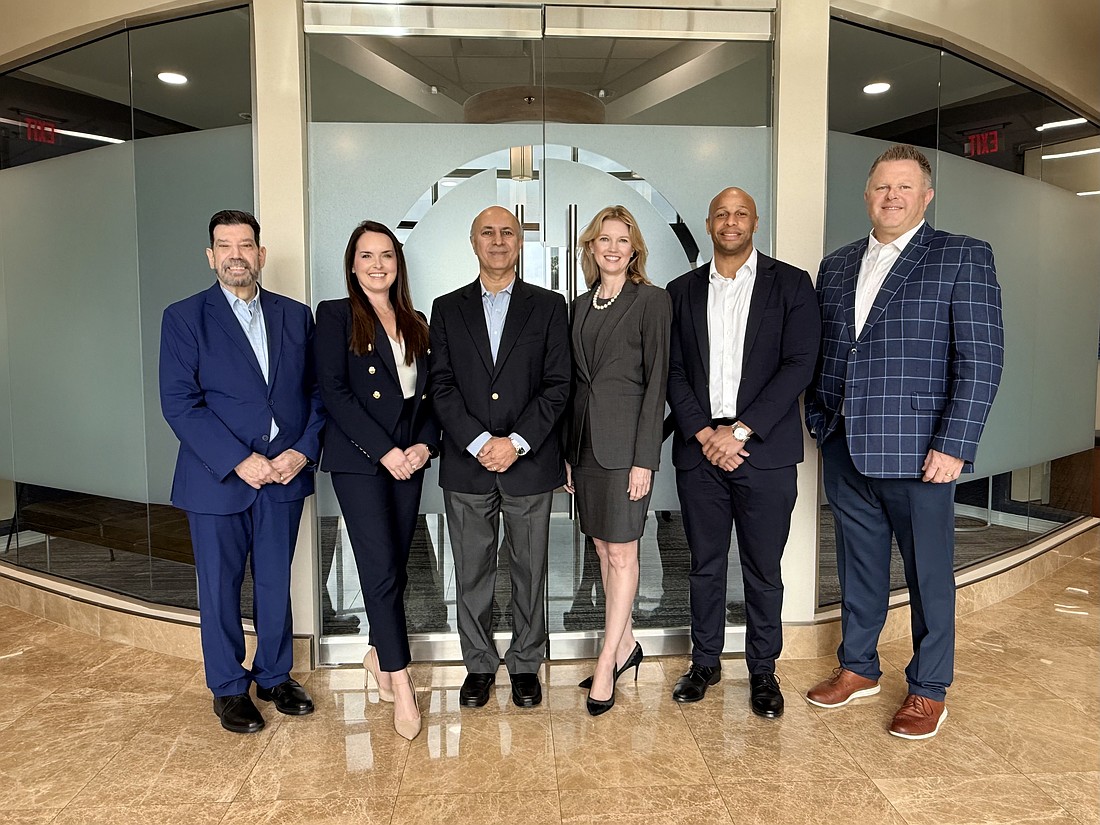 The executive leadership team at Borland Groover includes, from left: Chief Information Officer Vince Vitali, Ancillary Chief Operating Officer, Ancillary Jackie Kennedy, Chief Executive Officer Dr. Dinesh Madhok, Chief Human Resources Officer Pamela Nix, Clinic Chief Operating Officer Cloyd Thomas Jr. and Chief Financial Officer Tom Bailey.