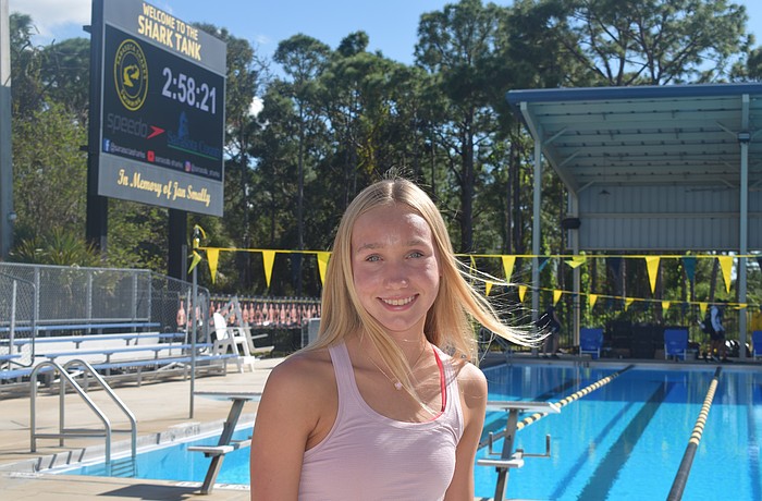 Dru Hershberger poses for a photo on Oct. 28 at Selby Aquatic Center before a practice with Sarasota Sharks. The freshman won gold for Sarasota Christian in the 500-meter freestyle at the FHSAA Class 1A District 8 championship.