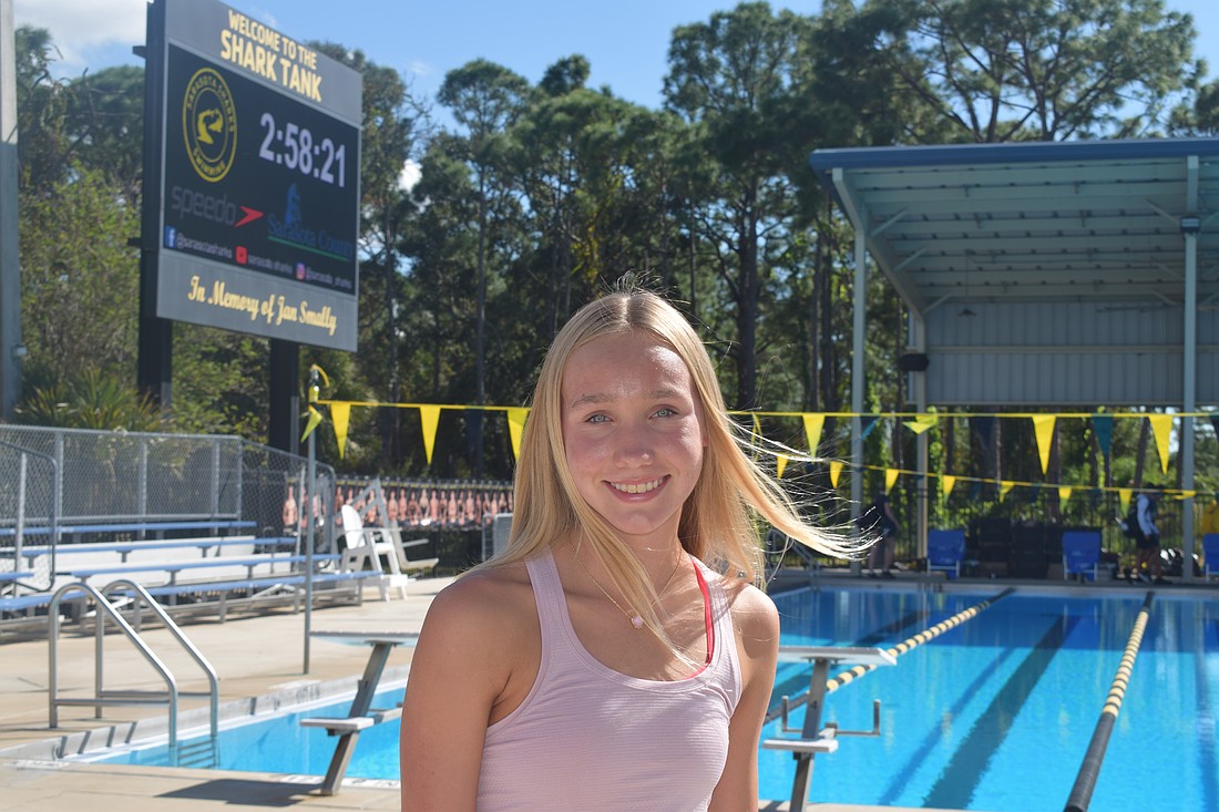Dru Hershberger poses for a photo on Oct. 28 at Selby Aquatic Center before a practice with Sarasota Sharks. The freshman won gold for Sarasota Christian in the 500-meter freestyle at the FHSAA Class 1A District 8 championship.