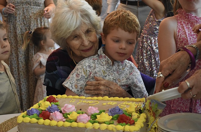 Carol Siegler sits with her great-grandson Miles Dadosky, 4.