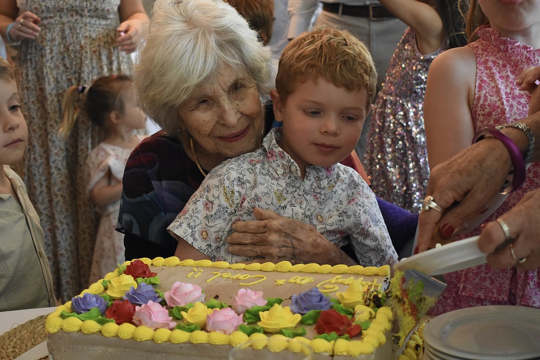 Carol Siegler sits with her great-grandson Miles Dadosky, 4.