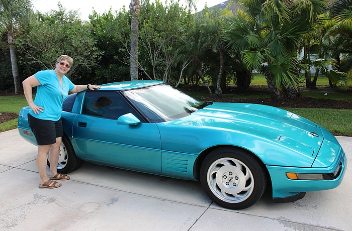 Panther Preserve's Emily Kasperski shows off her beloved Bam, which will be on display at the Knights of Columbus Car Show and Cookout Nov. 1 at Our Lady of the Angels Catholic Church.