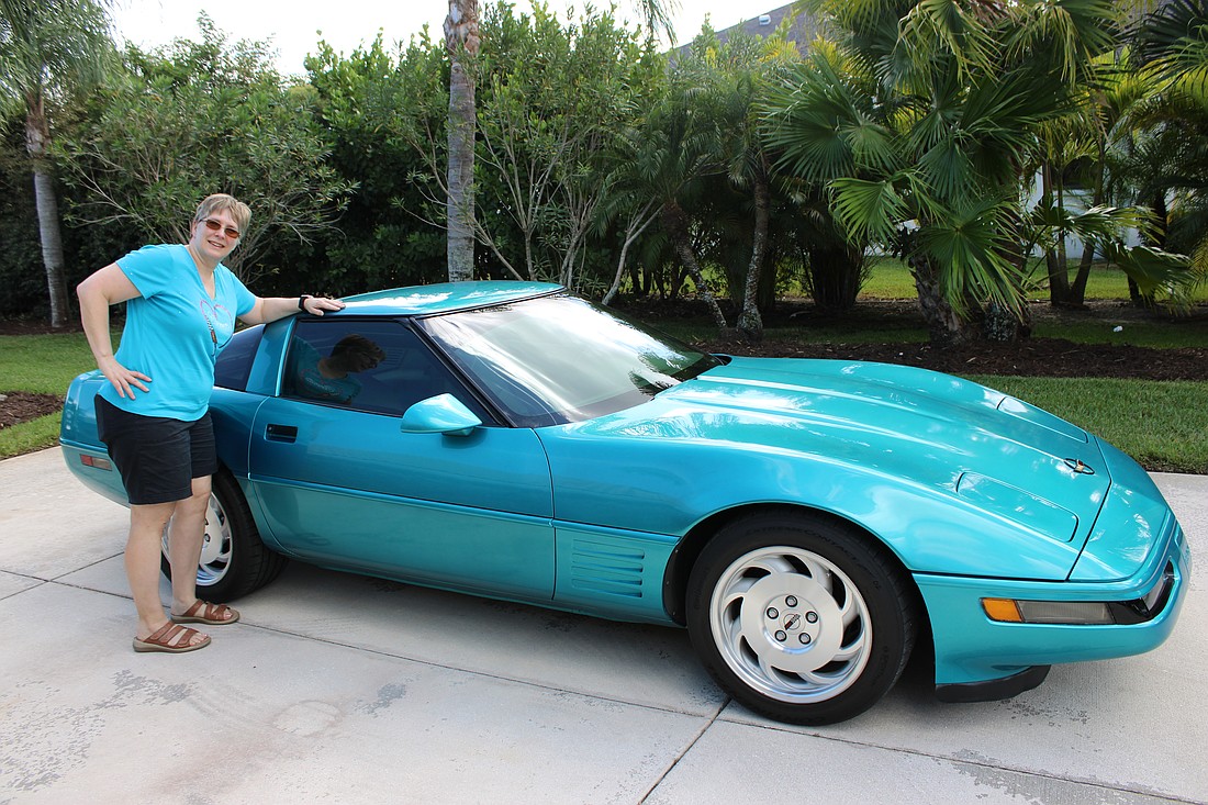 Panther Preserve's Emily Kasperski shows off her beloved Bam, which will be on display at the Knights of Columbus Car Show and Cookout Nov. 1 at Our Lady of the Angels Catholic Church.