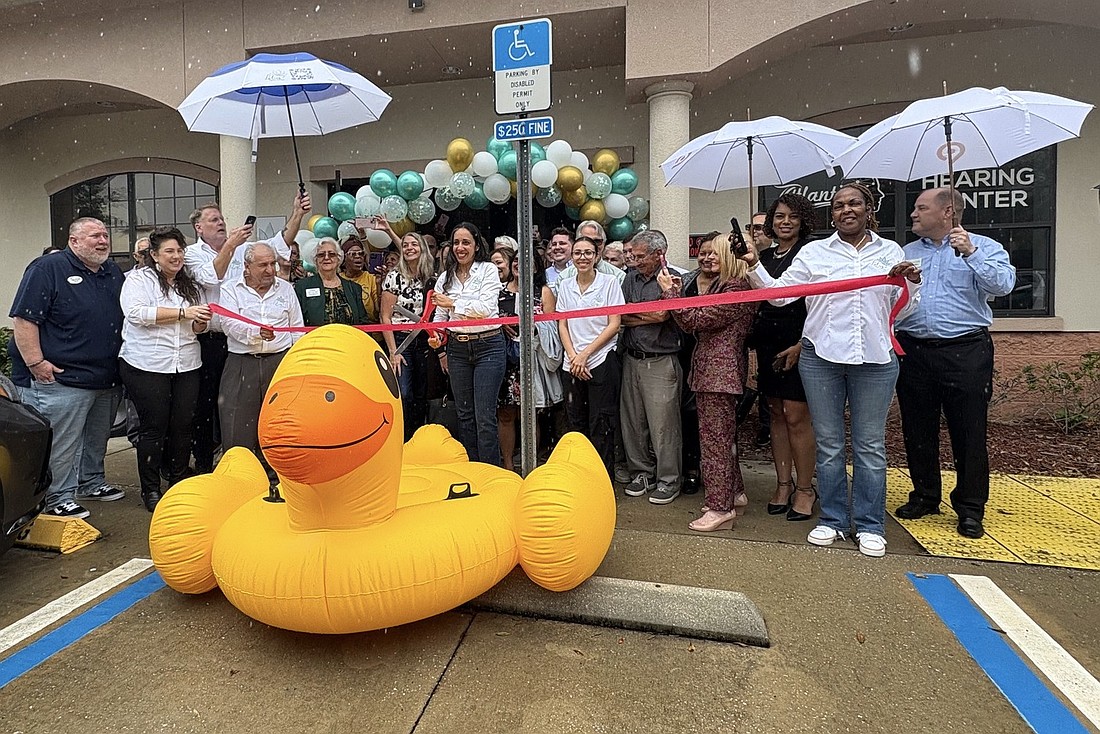 Ribbon cutting at Lotus Funeral Services on Oct. 10. Courtesy photo