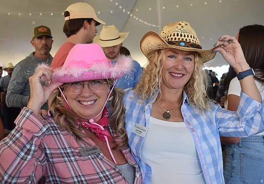 Bank OZK's Lisa Lawler and Kate Mulligan, executive director of the Lakewood Ranch Community Foundation, are among those who dressed in Western attire for the 36th annual Hob Nob Oct. 29 at the Lakewood Ranch Library.