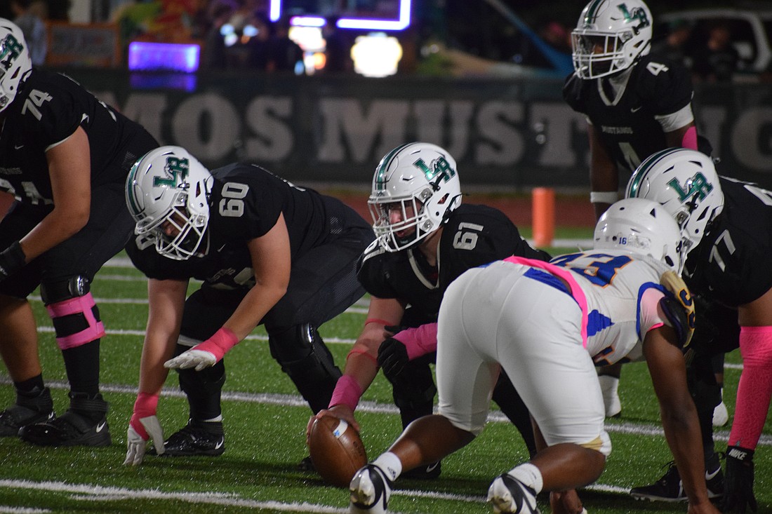Lakewood Ranch's offensive line prepares to snap the ball against Bayshore during its Oct. 30 regular-season finale. The Mustangs still have yet to notch back-to-back winning seasons since 2010-11.