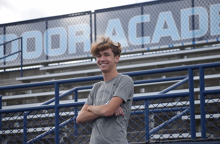 Kevin Gyurka poses for a photo on Oct. 31 at Out-of-Door Academy's Thunder Stadium. The senior long-distance runner has won two races in the 2025 cross country season, and boasts five top-10 finishes in seven meets.