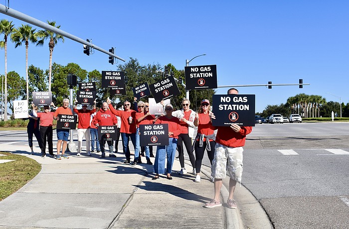 The Lakewood Ranch Community Action Group protests a possible gas station on the corner of 44th Avenue East and White Eagle Boulevard Nov. 1.