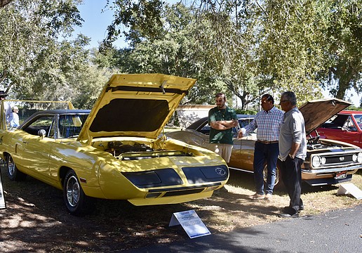 A 1970 Plymouth Superbird draws a few admirers.