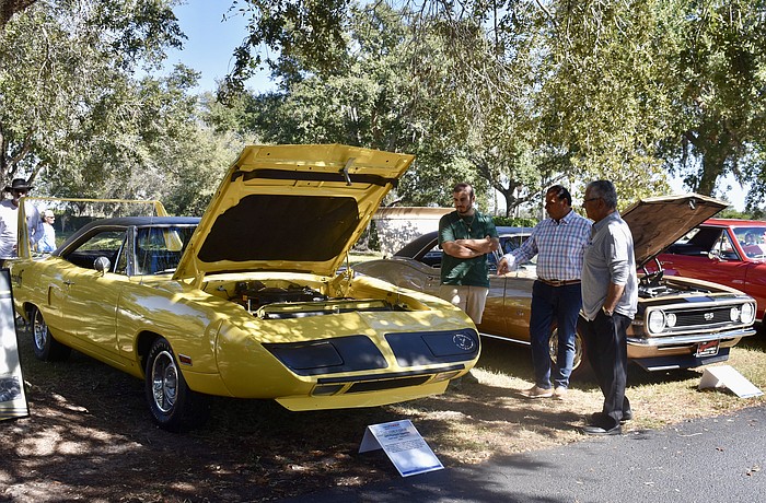 A 1970 Plymouth Superbird draws a few admirers.