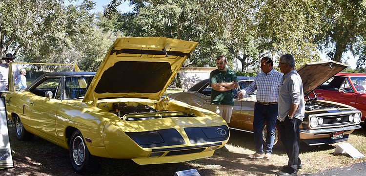 A 1970 Plymouth Superbird draws a few admirers.
