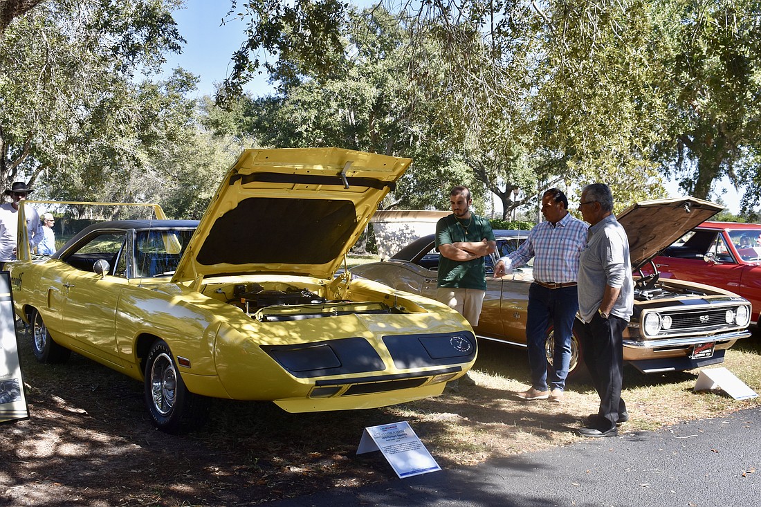 A 1970 Plymouth Superbird draws a few admirers.