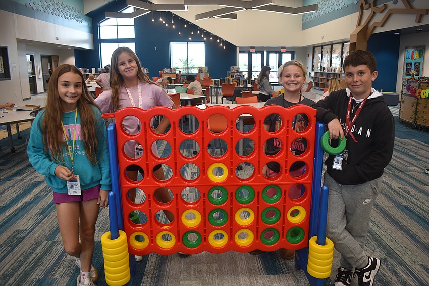 Cora Ortega, Brinley Bush, Chloe Collier and Giovanni Rizzo are fifth graders at Lake Manatee this year, which will make them the first class of sixth graders in the middle school next year.