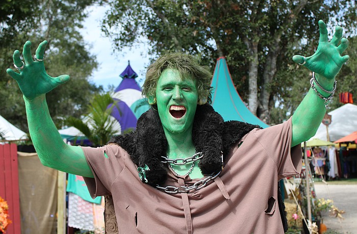 Cape Coral's John Svidroniv IV paints himself green as a goblin for the Sarasota Medieval Fair, where creatures of all shapes and sizes gather for a magical day.