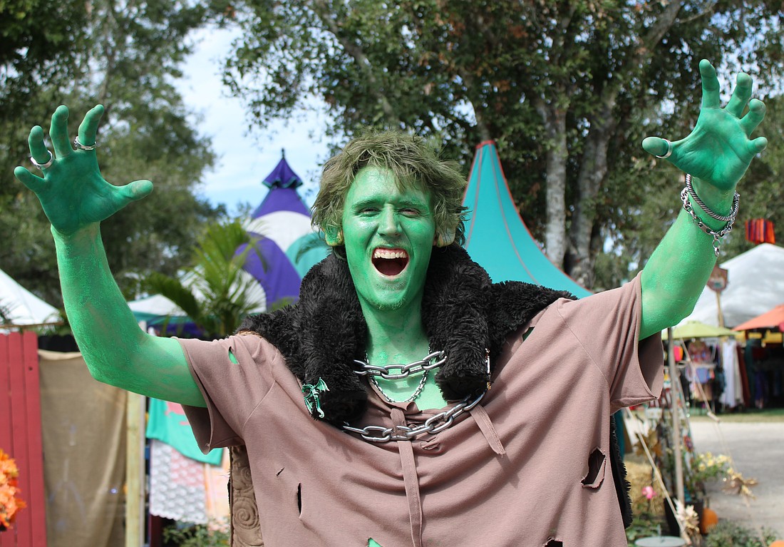 Cape Coral's John Svidroniv IV paints himself green as a goblin for the Sarasota Medieval Fair, where creatures of all shapes and sizes gather for a magical day.