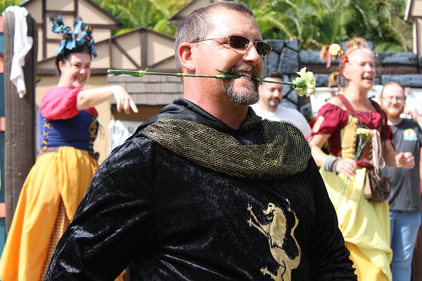 Sebring's Ray Barry is one of the audience members to become part of the Washing Well Wenches show. He said he will do anything to make his wife Lisa smile.