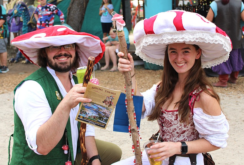 Orlando's Sebastian White and Miranda Cassidy dress as mushrooms. Cassidy made her hat from scratch and hands out different mushroom themed trinkets to other festival goers because she loves seeing people light up.