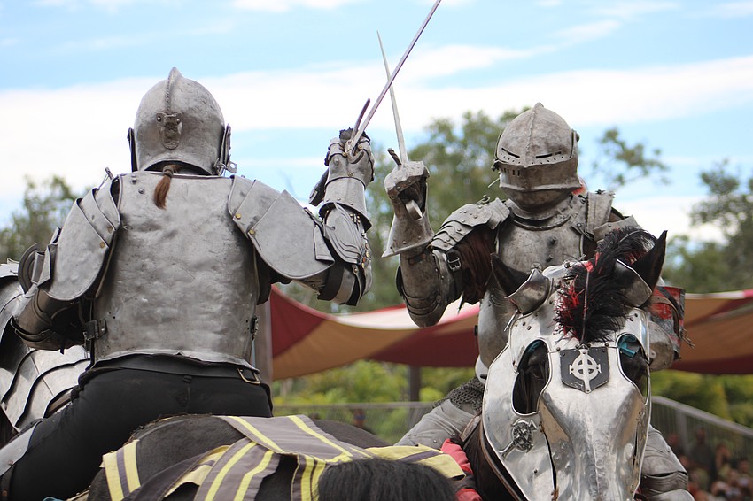 New Riders of the Golden Age perform theatrical medieval jousts at the Sarasota Medieval Fair on horseback.