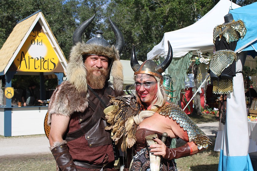 Sarasota's Nick Blair and Cape Coral's Kari Cordisco make new friends out of each other when they both won the costume contest during the viking themed weekend.